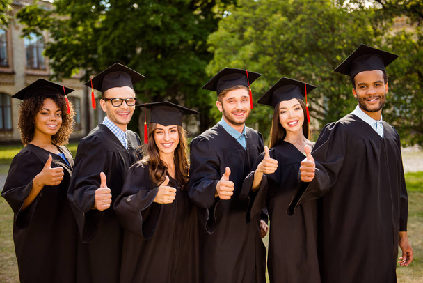 Six successful joyful multi ethnic attractive young graduates in - Foto, Imagem