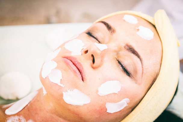 Cosmetic facial treatment at the spa. - Photo, Image