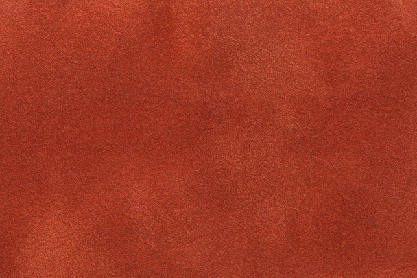 Arrière-plan de tissu de daim orange foncé gros plan. Texture velours mat de nubuck de gingembre textile
 - Photo, image