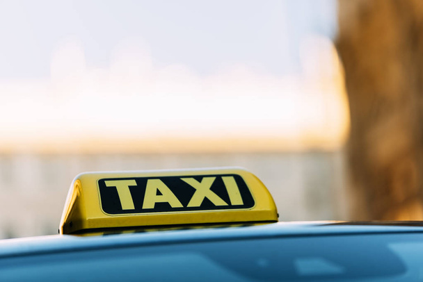Close up of a taxi roof sign in Vienna. - Fotoğraf, Görsel