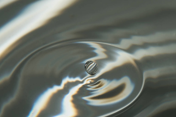 A single water droplet falling - Photo, Image