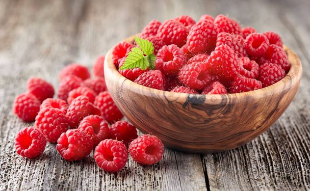 Raspberry on a wooden background - Photo, Image