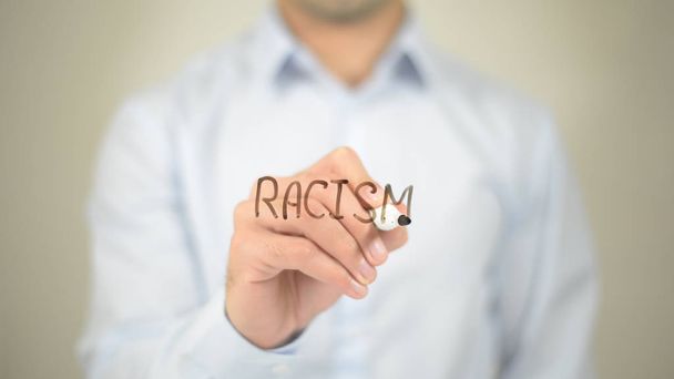 Rassismus, Mann schreibt auf transparentem Bildschirm - Foto, Bild