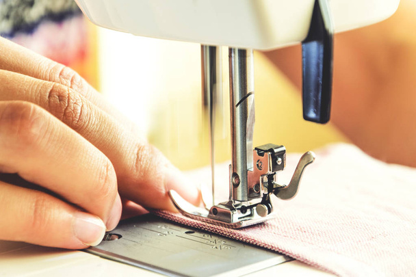 Sewing process on the sewing machine - Fotó, kép