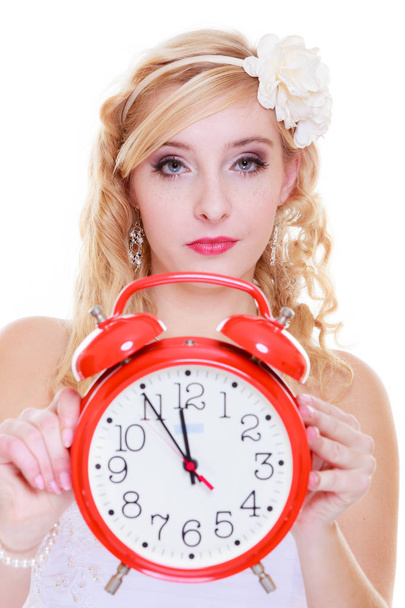 Woman bride holding big red clock - Photo, Image
