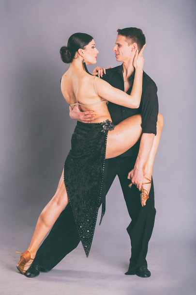 Ballroom Dancers on a gray background - Photo, image