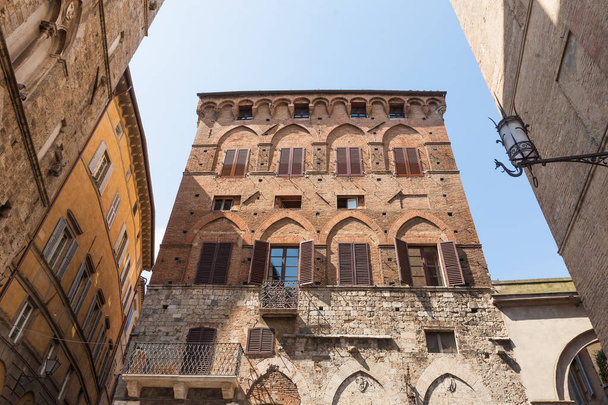Old houses in Siena, Italy - Фото, зображення