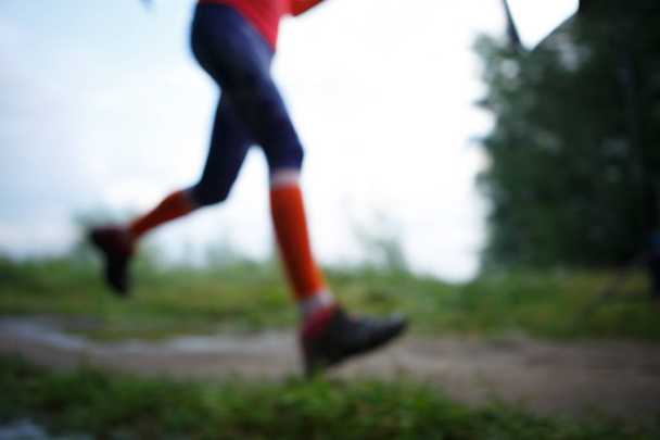 Blurred photo of running woman - Фото, изображение