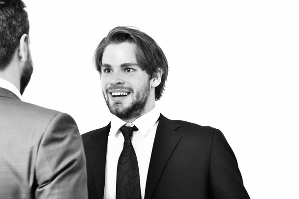 boss and employee, happy men in jacket speaking at meeting - Fotó, kép