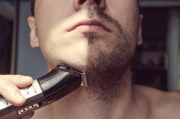 Young bearded man during grooming - Photo, Image