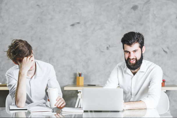 Attractive tired men at work  - Foto, Bild