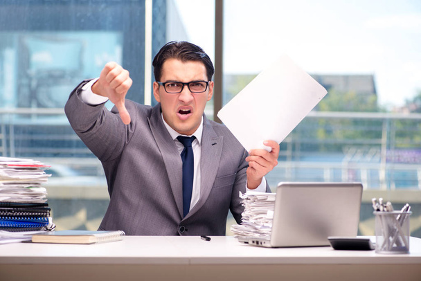 Angry businessman with too much work in office - Photo, Image