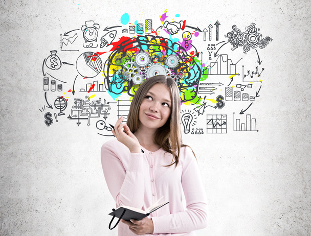 Woman with a planner, colorful brain cogs - Photo, Image