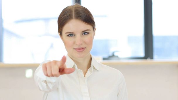 Pointing toward Camera, Woman in Office - Photo, Image