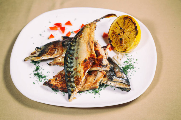 Fried mackerel on the table - Photo, Image