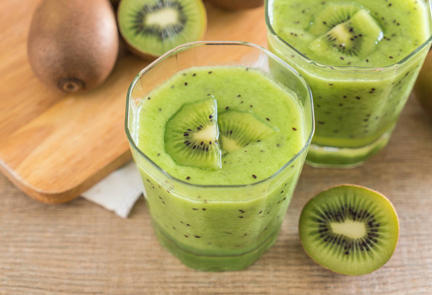Healthy fresh kiwi smoothie in glass - Photo, image