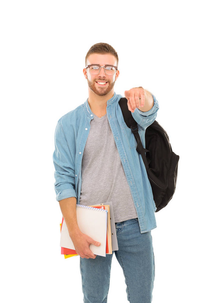Учень-чоловік зі шкільною сумкою тримає книжки ізольовані на білому тлі. Можливості для освіти. Студент коледжу
. - Фото, зображення