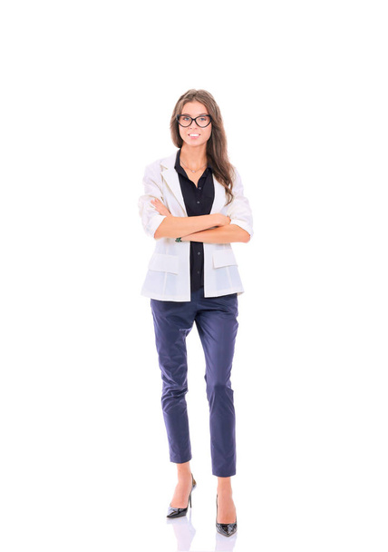 Young woman standing, isolated on white background. Young woman. - 写真・画像