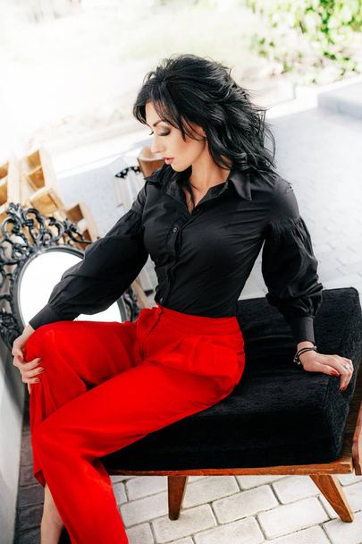 young woman   posing in red pants - Fotografie, Obrázek