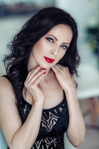 Beautiful young woman with red lips - Фото, изображение