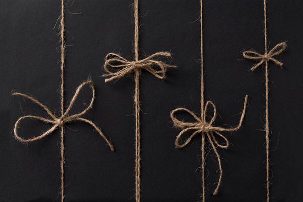 Rope bows isolated on black - Φωτογραφία, εικόνα