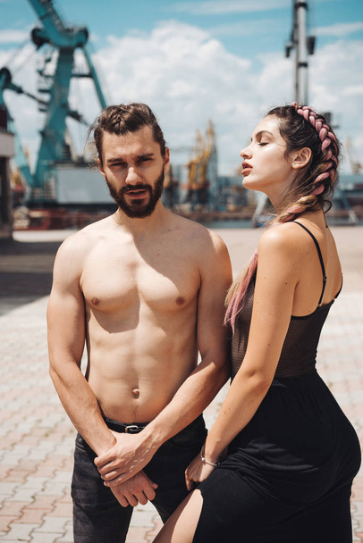 A guy and a girl are posing in the port - Photo, Image