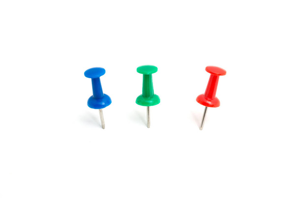 Three color push pin and on isolated white background - Photo, Image