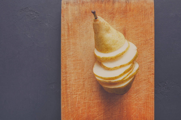 Comida saludable, fondo de fruta, pera en rodajas
 - Foto, Imagen