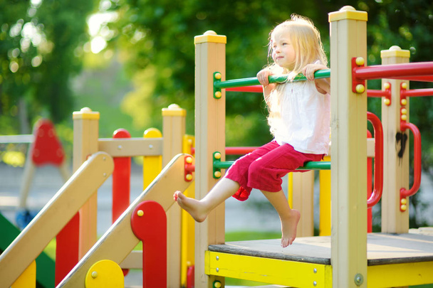 little girl on playground  - Zdjęcie, obraz