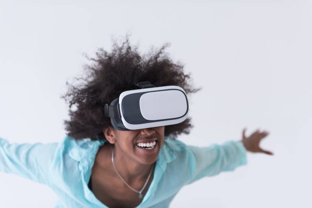 black girl using VR headset glasses of virtual reality - Valokuva, kuva