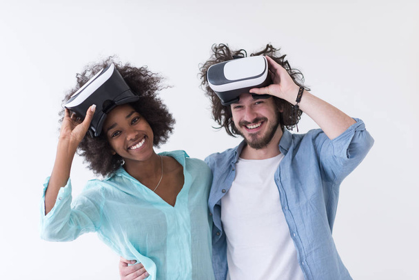 multiethnic couple getting experience using VR headset glasses  - Fotoğraf, Görsel