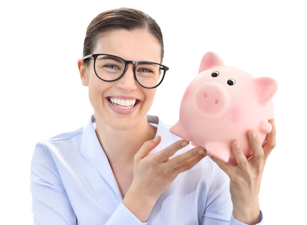 smiling fun woman with piggy bank isolated on white background - Fotografie, Obrázek
