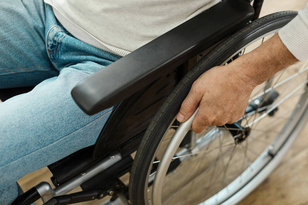 Modern wheelchair being in use - Foto, Imagen