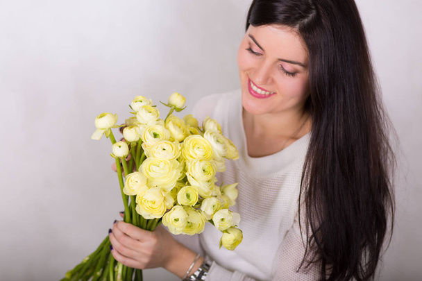 Woman with a bouquet - Photo, image