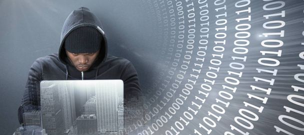 focused male hacker using laptop  - Fotó, kép
