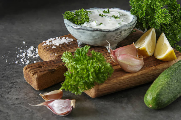 Sauce Tsatsiki with ingredients of cucumbers, garlic, parsley, l - Φωτογραφία, εικόνα