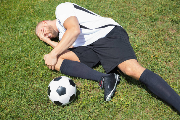 Player Suffering From Leg Injury - Zdjęcie, obraz