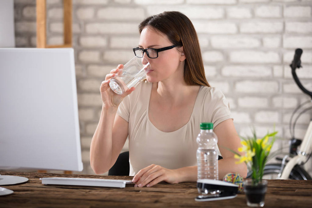 Woman Drinking Water  - Фото, изображение