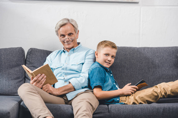 family with book and digital tablet   - Photo, Image