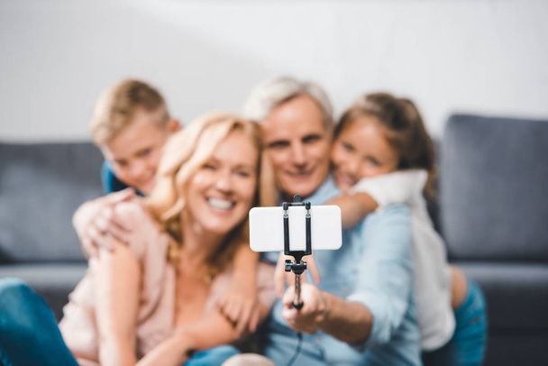 family taking selfie - 写真・画像