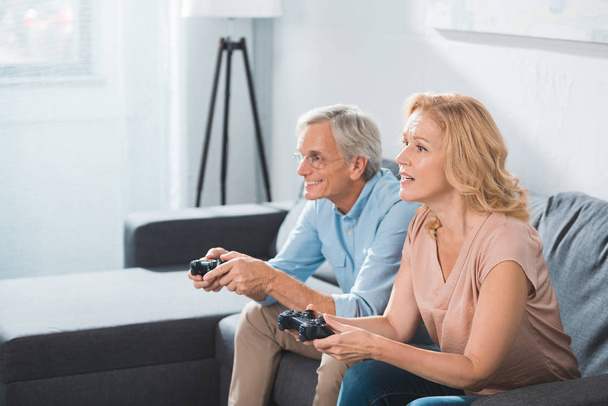 couple playing video game - Photo, Image