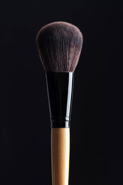 powderbrush on black background - Foto, Imagem