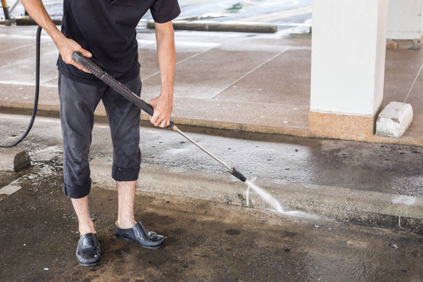 Outdoor floor cleaning with high pressure water jet - Foto, Imagen