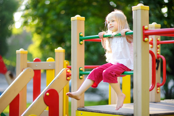 little girl on playground  - Foto, afbeelding