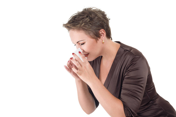 Young sick woman blowing her nose - 写真・画像
