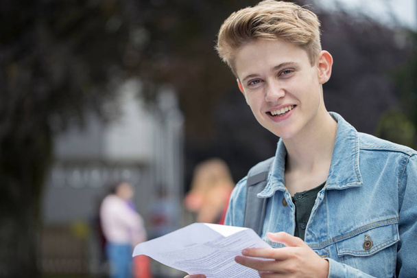 Portrait Of Teenage Boy Happy With Exam Results - Photo, image