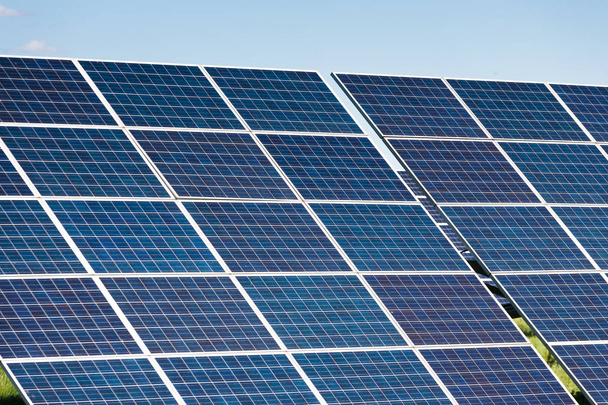Solar panels against blue sky background - Фото, зображення