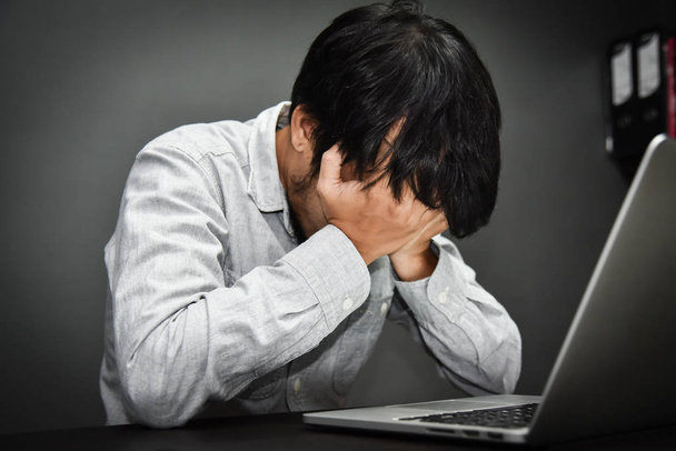 Stressed Asian businessman. - Photo, image