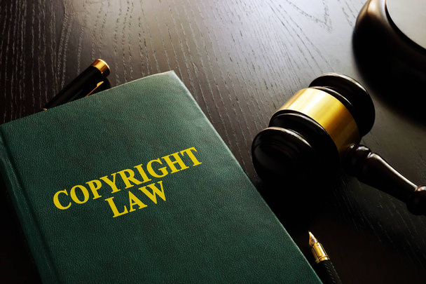 Copyright law and gavel on a table. - Фото, зображення