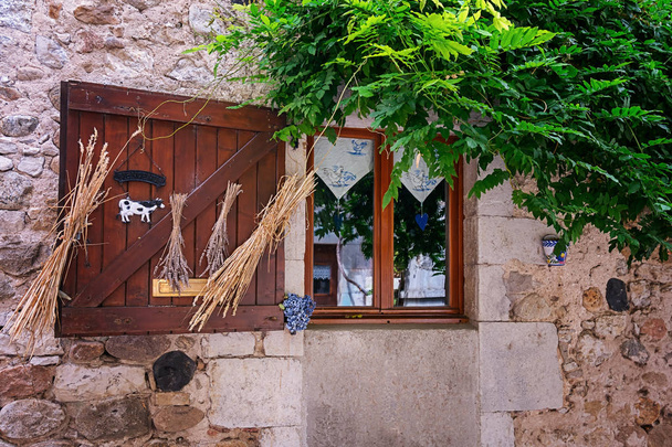 Decorated window in the village Vogue n the Ardeche region of Fr - Fotó, kép